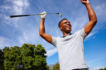 Man celebrating his golf shot